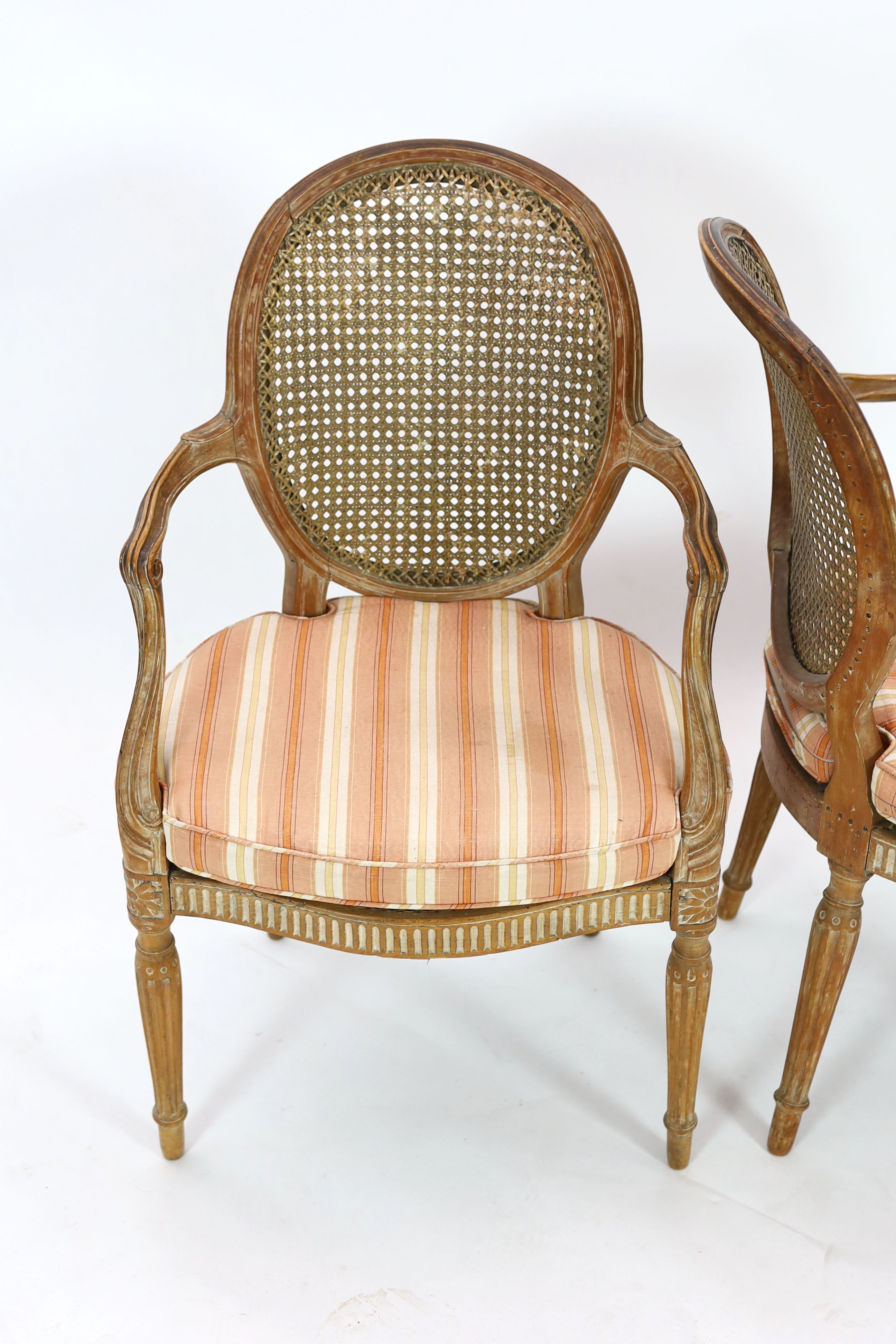 A set of four late 18th century French carved beech fauteuils, W.54cm D.53cm H.91cm